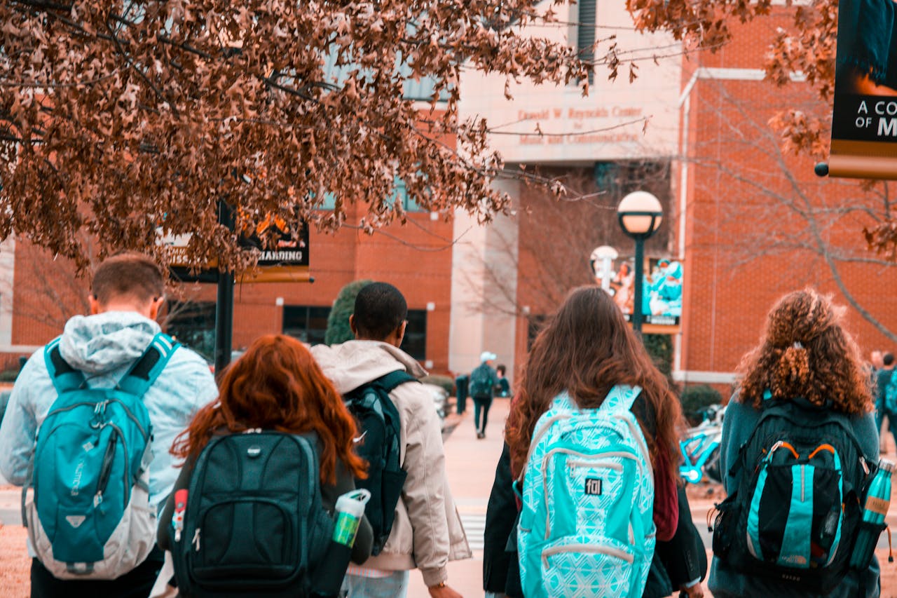 A Group of People Wearing Backpacks