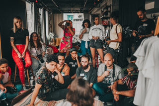 Group of diverse people gathering and listening to lecture